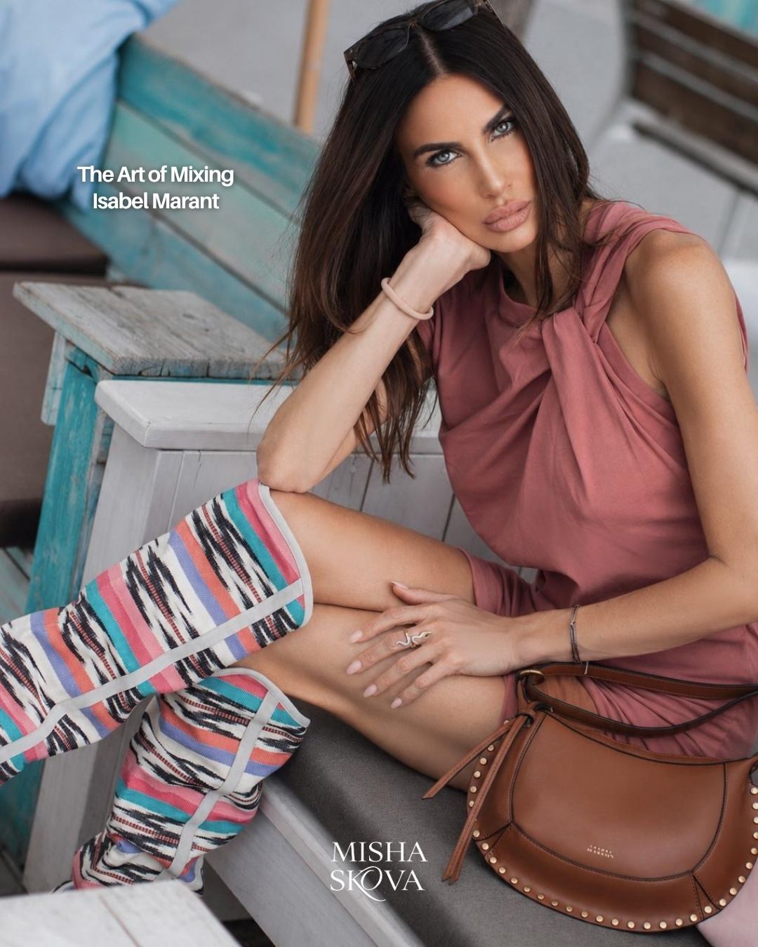 Misha Skova wearing a rose Isabel Marant dress, colorful boots and cognac leather bag in Brno